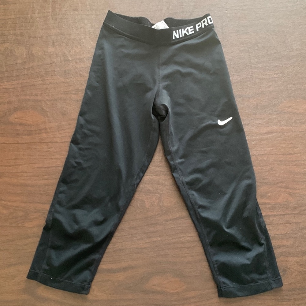 This is black cropped Nike leggings.